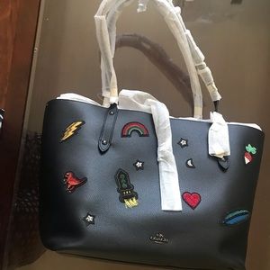 COACH
Market Tote with Souvenir Embroidery Detail